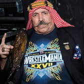 Iron Sheik poses backstage at Power 96.1's Jingle Ball 2013 at Philips Arena on December 11, 2013 in Atlanta, Georgia.  (Photo by Ben Rose/Getty Images for Clear Channel)
