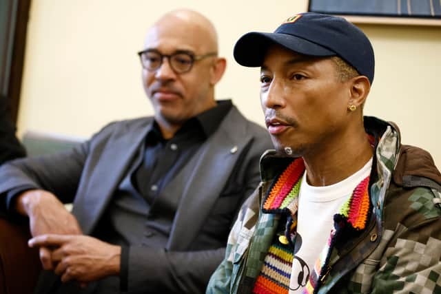 Harvey Mason Jr., CEO of the Recording Academy, and Pharrell Williams attend Grammys On The Hill: Advocacy Day on April 27, 2023 in Washington, DC. (Photo by Paul Morigi/Getty Images for The Recording Academy)