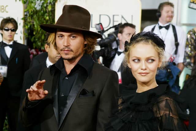 BEVERLY HILLS, CA - JANUARY 25:  Actor Johnny Depp with Vanessa Paradis attend the 61st Annual Golden Globe Awards at the Beverly Hilton Hotel on January 25, 2004 in Beverly Hills, California. (Photo by Carlo Allegri/Getty Images) 