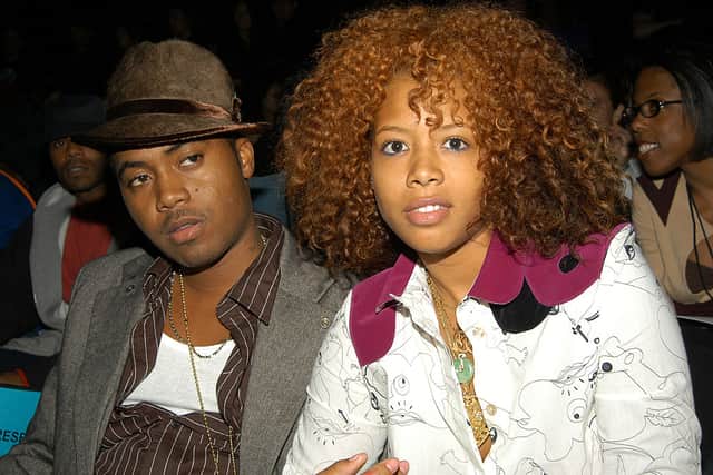 Rappers Nas (L) and Kelis appear at the Baby Phat Spring/Summer 2004 Collection fashion show September 13, 2003 in Bryant Park in New York City. (Photo by Lawrence Lucier/Getty Images)