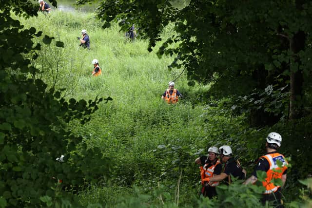 Community Rescue Service volunteers in thick undergrowth near the River Braid in Ballymena (Photo: Liam McBurney/PA Wire)