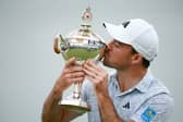 Nick Taylor holds the trophy after winning the RBC Canadian Open (Photo: Vaughn Ridley/Getty Images)