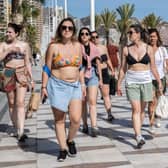 In some parts of Spain it’s against the law to be in the street wearing only a bikini or swimming shorts, or trunks (Photo: Getty Images)