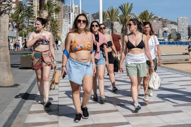 In some parts of Spain it’s against the law to be in the street wearing only a bikini or swimming shorts, or trunks (Photo: Getty Images)
