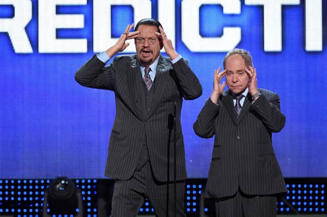 Penn Jillette (L) and Teller of the comedy/magic team Penn & Teller perform during the 2016 NHL Awards at The Joint inside the Hard Rock Hotel & Casino on June 22, 2016 in Las Vegas, Nevada. (Photo by Ethan Miller/Getty Images)