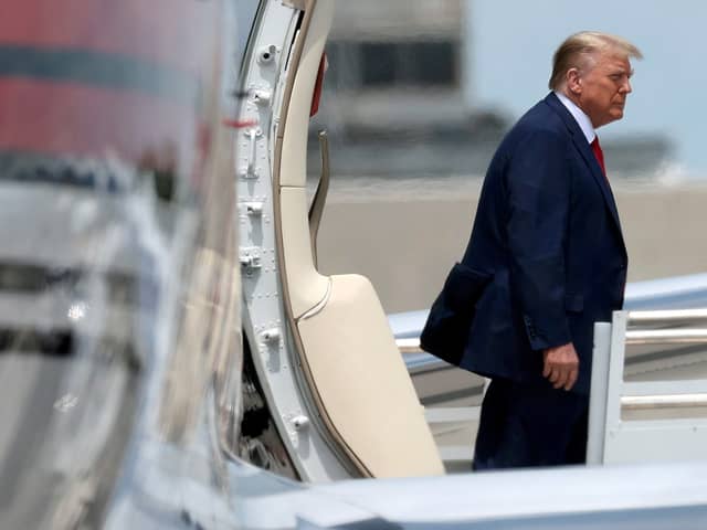 Republican presidential candidate former U.S. President Donald Trump arrives at the Miami International Airport June 12, 2023 in Miami, Florida. Trump is scheduled to appear tomorrow in federal court for his arraignment on charges including possession of national security documents after leaving office, obstruction, and making false statements.  (Photo by Win McNamee/Getty Images)