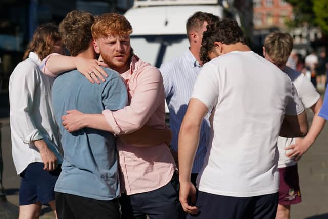 People at a vigil at St Peter's church in Nottingham, as a 31-year-old man has been arrested on suspicion of murder after three people were killed in Nottingham city centre early on Tuesday morning (Photo: Jacob King/PA Wire)