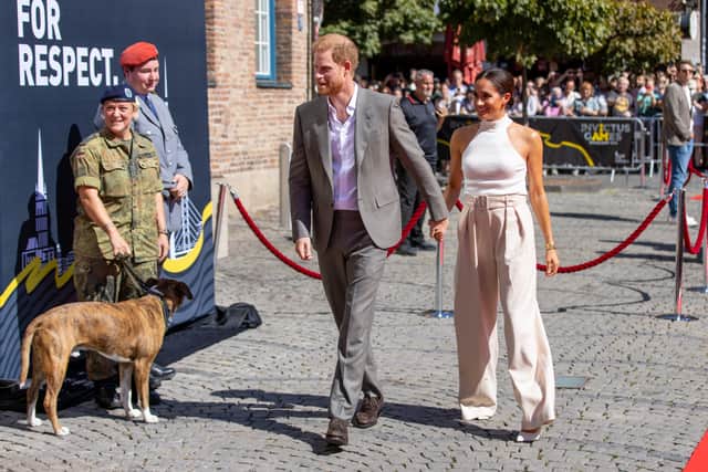 DUSSELDORF, GERMANY - SEPTEMBER 06:  Meghan, Duchess of Sussex and Prince Harry, Duke of Sussex arrive at the town hall during the Invictus Games Dusseldorf 2023 - One Year To Go events, on September 06, 2022 in Dusseldorf, Germany. (Photo by Joshua Sammer/Getty Images for Invictus Games Dusseldorf 2023)