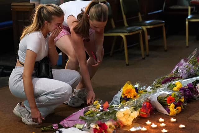 People at a vigil at St Peter’s church in Nottingham (Photo: Jacob King/PA Wire)