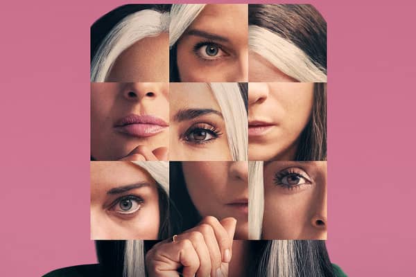 The poster for Black Mirror's Joan Is Awful. In place of Joan's face is a three-by-three grid made up of close-up images of Annie Murphy as Joan and Salma Hayek as Joan, all on a pink background (Credit: Netflix)