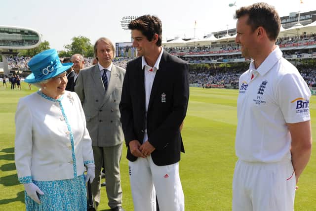 Queen Elizabeth II speaks with England captain Alastair Cook and Graeme Swann (right) ahead of the first day of the second test between England and Australia at Lord's Cricket Ground on July 18, 2013 in London, England.  (Photo by Anthony Devlin - WPA Pool/Getty Images)