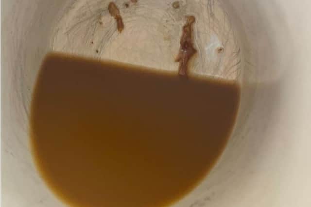 The ‘evidence’ found in the bottom of a cup of coffee made by Dr Nicholas Chapman (Photo: Avon and Somerset Police / SWNS)