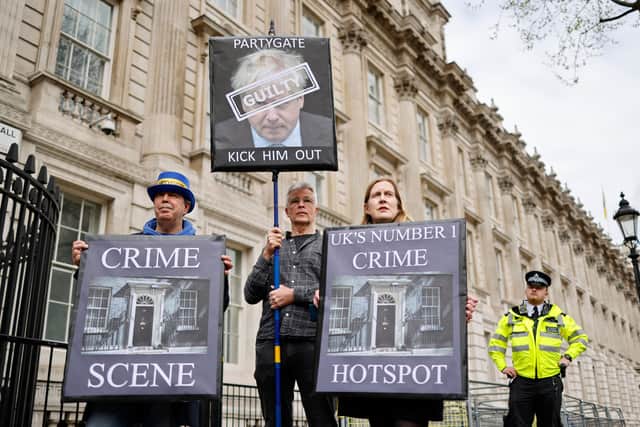 Demonstrators as they protest outside the entrance to 10 Downing Street. Picture: OLGA AKMEN/AFP via Getty Images
