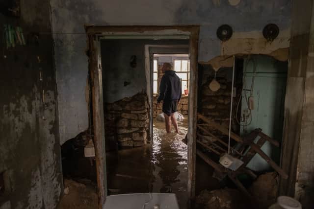 The impact from the dam's destruction has been felt across the wider region, threatening agriculture and drinking water in addition to the damage caused by floodwaters.  (Photo by Roman Pilipey/Getty Images)