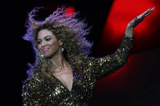US singer Beyonce performs on The Pyramid Stage as the headline act during the last day of the Glastonbury festival near Glastonbury, Somerset on June 26, 2011. (Credit: ADRIAN DENNIS/AFP via Getty Images)