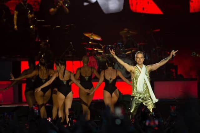Robbie Williams performed at both the Isle of Wight Festival and Pinkpop this weekend - Credit: BBC