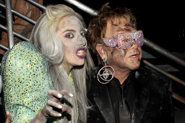 LOS ANGELES, CA - JANUARY 31:  Singers Lady Gaga (L) and Elton John backstage during the 52nd Annual GRAMMY Awards held at Staples Center on January 31, 2010 in Los Angeles, California.  (Photo by Christopher Polk/Getty Images)