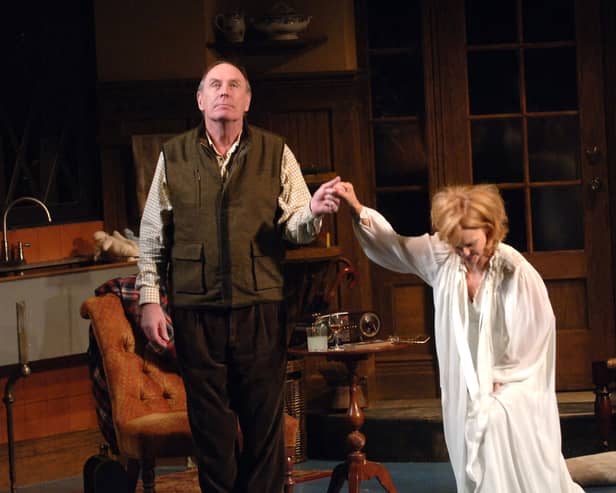 Paxton Whitehead and  Deborah Rush on stage at a 2005 performance of the Broadway play Absurd Person Singular