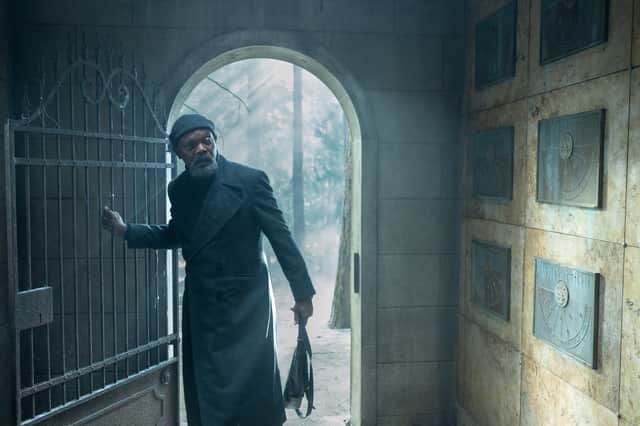 Samuel L. Jackson as Nick Fury in Secret Invasion, entering a mausoleum (Credit: Des Willie/Marvel Studios)