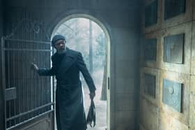 Samuel L. Jackson as Nick Fury in Secret Invasion, entering a mausoleum (Credit: Des Willie/Marvel Studios)