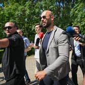 Controversial influencer Andrew Tate arriving at the Municipal Court of Bucharest, Romania, on human trafficking and rape charges (Photo by DANIEL MIHAILESCU/AFP via Getty Images)