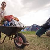 A man arrives with his beer supplies on the first day of Glastonbury 2009 (Photo: Leon Neal/AFP via Getty Images)