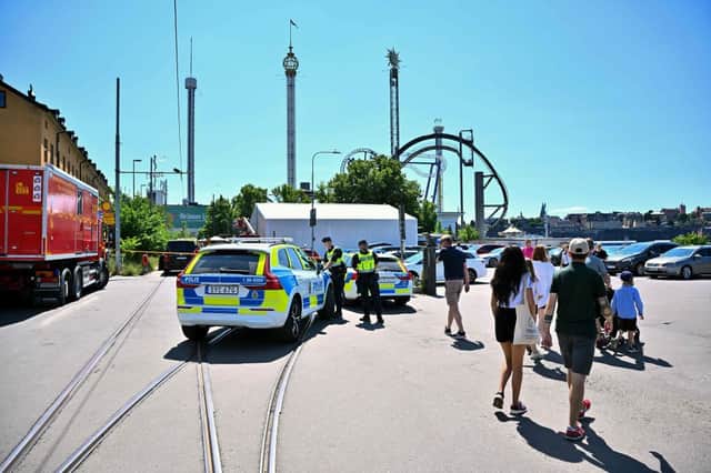 A photo taken on June 25, 2023 shows police at the Grona Lund amusement park, after an accident occurred in the ‘Jetline’ rollercoaster, leaving one person dead. Credit: CLAUDIO BRESCIANI/TT NEWS AGENCY/AFP via Getty Images