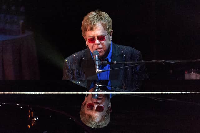 Sir Elton John performs on stage during the 2013 Carnegie Hall Medal Of Excellence Gala at The Waldorf=Astoria on June 13, 2013 in New York City.  (Photo by D Dipasupil/Getty Images)