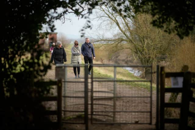 Louise Cunningham (centre), the sister of missing Nicola Bulley, visits the scene where Nicola Bulley's mobile phone was found on a bench next to the River Wyre (Photo by Christopher Furlong/Getty Images)
