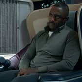 Idris Elba as Sam Nelson in Hijack, flying in business class (Credit: Apple TV+)