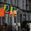 House prices are dropping by more than 5% in more than four out of ten sales, according to a new report by real estate company Zoopla. (Credit: AFP via Getty Images)