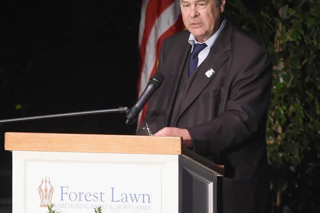 Actor Dan Aykroyd speaks onstage at Debbie Reynolds and Carrie Fisher Memorial at Forest Lawn Cemetery on March 25, 2017 in Los Angeles, California.  (Photo by Kevin Winter/Getty Images)