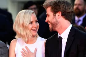 Jennifer Lawrence and Liam Hemsworth starred in three Hunger Games movies from 2012 to 2015 - Credit: Getty