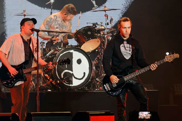 (L-R) Patrick Stump, Andy Hurley, and Pete Wentz of Fall Out Boy perform onstage at the 2023 iHeartRadio ALTer EGO Presented by Capital One at The Kia Forum on January 14, 2023 in Inglewood, California. (Photo by Kevin Winter/Getty Images for iHeartRadio)