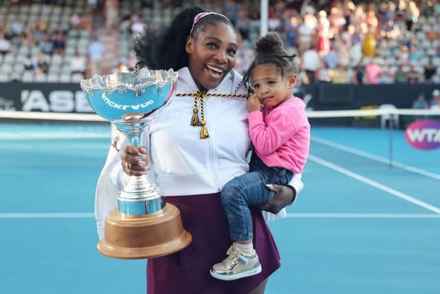 Serena Williams with daughter Olympia - Credit: Getty