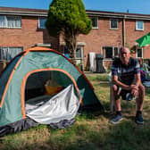Gary Lambert, who is camping outside of his former home. Picture:  SWNS