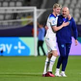 England’s Anthony Gordon celebrates with manager Lee Carsley after win over Portugal