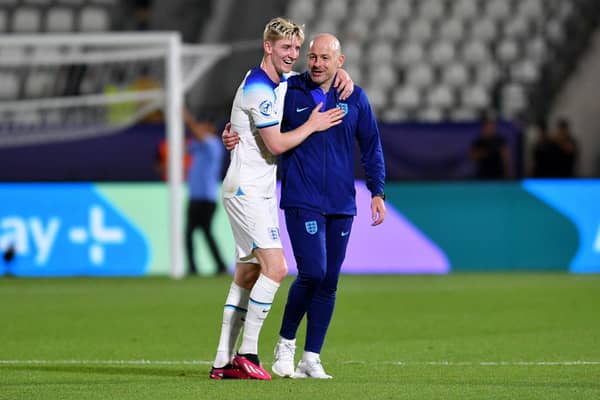 England’s Anthony Gordon celebrates with manager Lee Carsley after win over Portugal