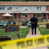 Baltimore Police investigate the site of a mass shooting in the Brooklyn Homes neighbourhood on July 2, 2023 in Baltimore, Maryland. (Photo by Nathan Howard/Getty Images)