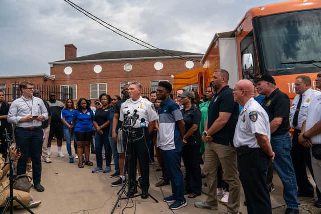 Baltimore Police Department acting commissioner Richard Worley and Baltimore Mayor Brandon Scott speak during a press conference at the site of a mass shooting in the Brooklyn Homes neighborhood on July 2, 2023 in Baltimore, Maryland. (Photo by Nathan Howard/Getty Images)