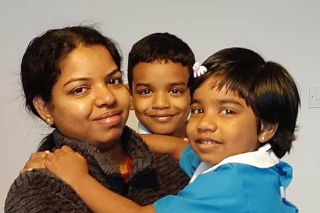 NHS nurse Anju Ashok and her children, six-year-old Jeeva Saju and Janvi Saju, aged four (Photo: Thomson Sarah/PA Wire)
