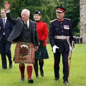 Britain's King Charles III (C), wearing a kilt, visits Kinneil House in Edinburgh, Scotland on July 3, 2023, marking the first Holyrood Week since his coronation. (Photo by Andrew Milligan / POOL / AFP) (Photo by ANDREW MILLIGAN/POOL/AFP via Getty Images)