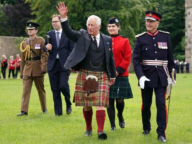 Britain's King Charles III (C), wearing a kilt, visits Kinneil House in Edinburgh, Scotland on July 3, 2023, marking the first Holyrood Week since his coronation. (Photo by Andrew Milligan / POOL / AFP) (Photo by ANDREW MILLIGAN/POOL/AFP via Getty Images)