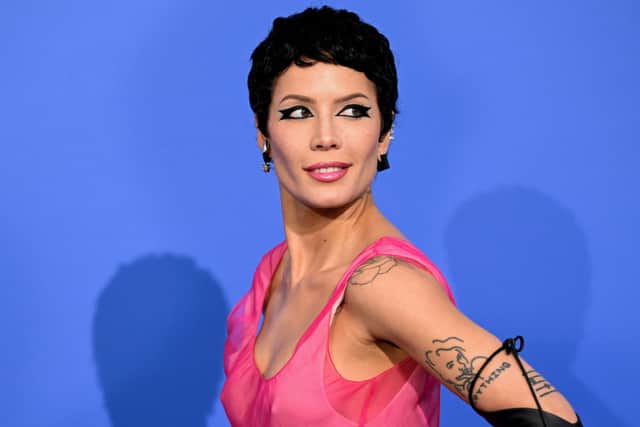 US singer Halsey arrives to attend the annual amfAR Cinema Against AIDS Cannes Gala at the Hotel du Cap-Eden-Roc in Cap d'Antibes, southern France, on the sidelines of the 76th Cannes Film Festival, on May 25, 2023. (Photo by Stefano Rellandini / AFP)