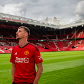 Mason Mount poses at Old Trafford following move to Manchester United