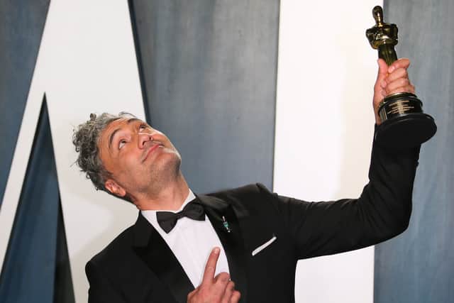 New Zealand director-actor Taika Waititi poses with his award for Best Adapted Screenplay for "Jojo Rabbit" as he attends the 2020 Vanity Fair Oscar Party following the 92nd Oscars at The Wallis Annenberg Center for the Performing Arts in Beverly Hills on February 9, 2020. (Photo by Jean-Baptiste Lacroix / AFP) (Photo by JEAN-BAPTISTE LACROIX/AFP via Getty Images)
