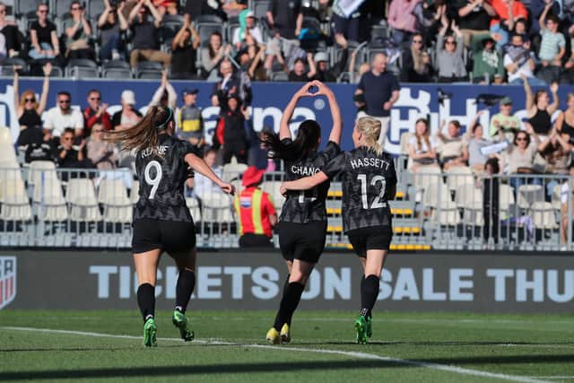 Olivia Chance of New Zealand celebrates an early goal with team mates Gabi Rennie, left, and  Betsy Hassett. (Photo by Peter Meecham/Getty Images)