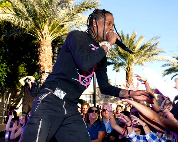 Rapper Travis Scott, who announced a UK tour earlier this week, has settled alongside Live Nation almost all the wrongful death lawsuits stemming from the 2021 Astroworld Festival tragedy. (Photo by Mike Coppola/Getty Images for Fanatics)