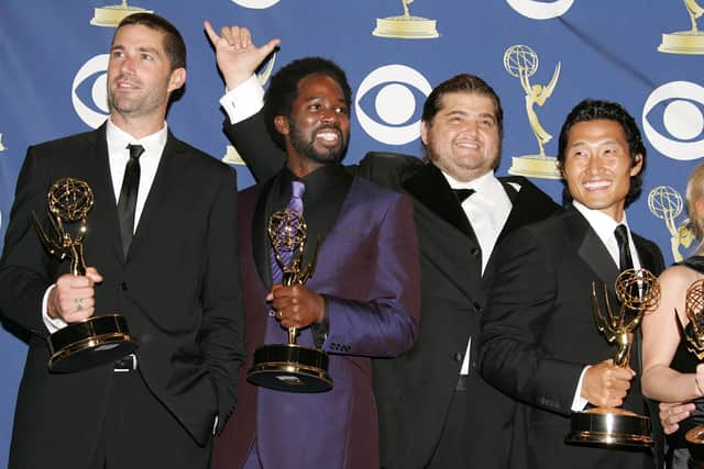 Matthew Fox, Harold Perrineau Jr., Jorge Garcia and Daniel Dae Kim pose with the Emmy for Outstanding Drama Series for Lost in September 2005. Perrineau spoke extensively with Ryan about the behind the scenes culture on Lost for Burn It Down (Credit: Frazer Harrison/Getty Images)