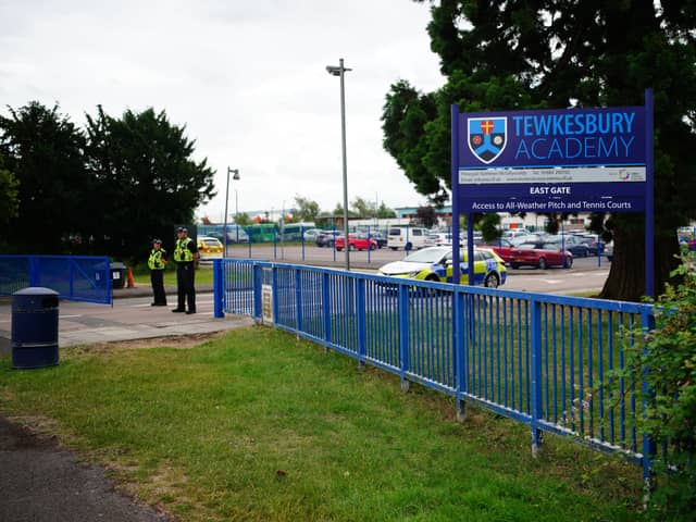 Emergency services at Tewkesbury School in Gloucesershire, where a teenage boy was arrested following reports a pupil stabbed a teacher (Photo: Ben Birchall/PA Wire)